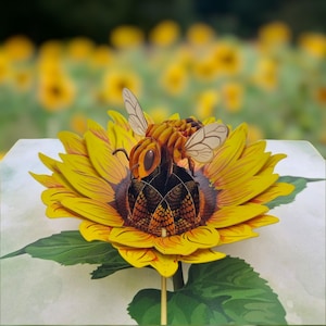Biglietto pop-up con girasole e ape