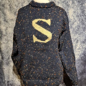 Knitted jumper with initial deals