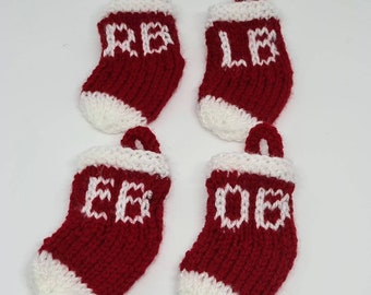 Set of four hand knitted personalised mini stocking Christmas decorations/ hand knitted Christmas tree decorations