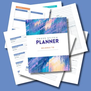 May include: A collection of white paper sheets against a blue backdrop. The top sheet is a planner with the words "Cross Stitch Planner" and "Belongs To" printed on it. Other sheets have lines and boxes for notes and scheduling.