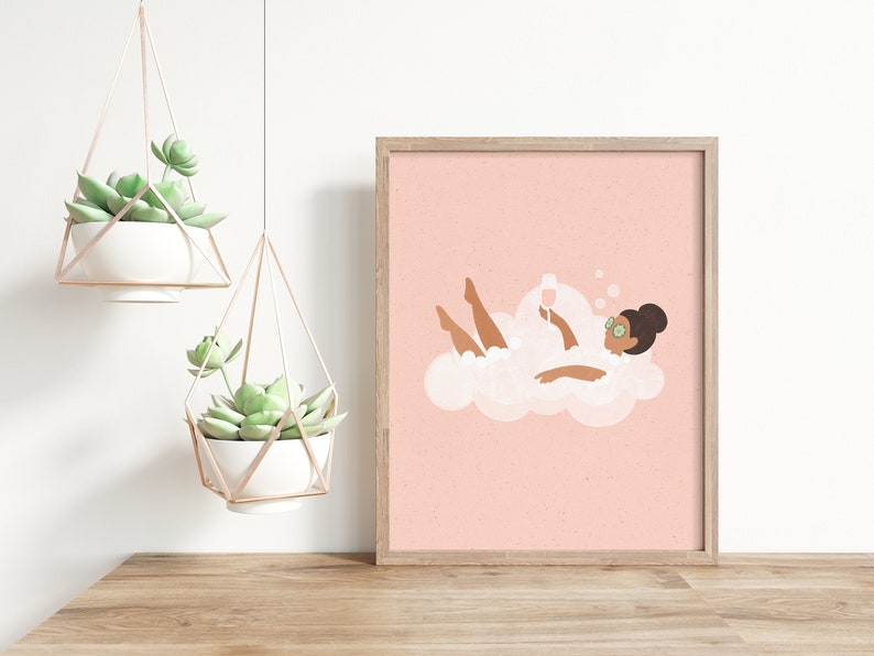 May include: A pink and white illustration of a person relaxing in a bubble bath with a glass of wine. The person is wearing cucumber eye patches and has brown skin and hair.