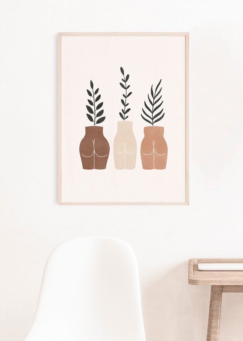 May include: Three abstract vases with different skin tones, each with a leafy plant growing from the top. The vases are in a minimalist style and are a light brown, beige, and terracotta color.