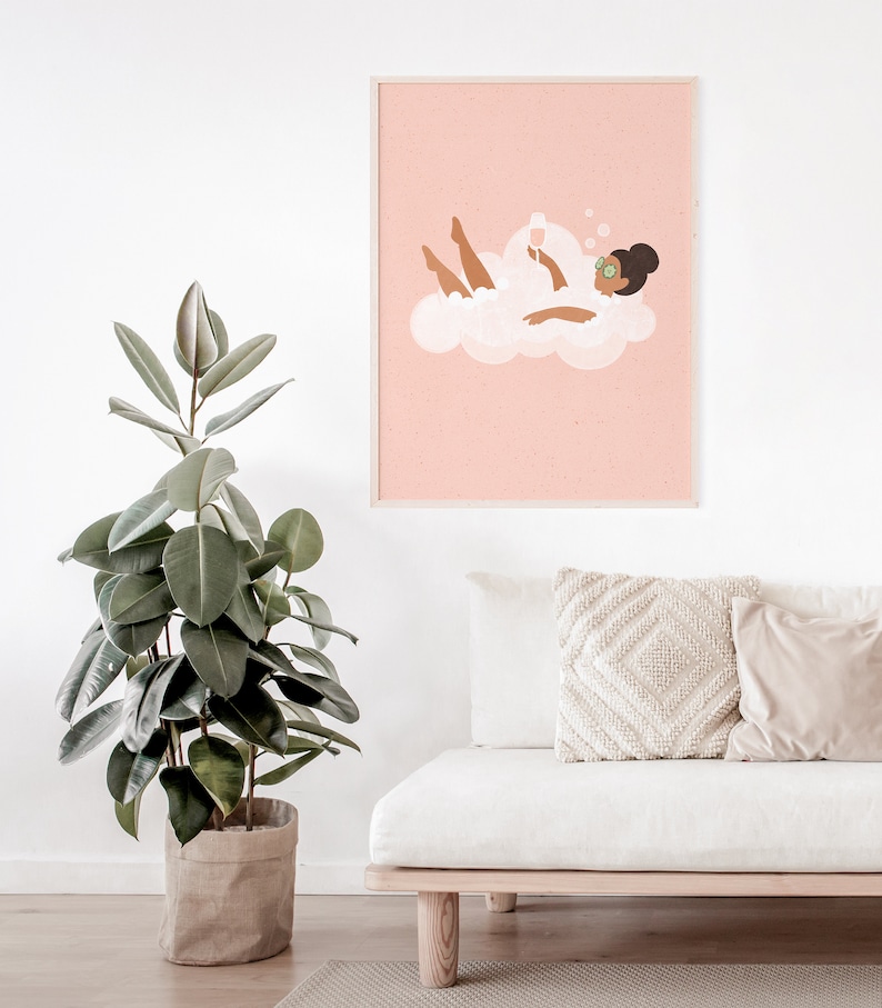 May include: A pink and white illustration of a person relaxing in a bubble bath with a glass of wine. The person is wearing a headband and has cucumber slices on their eyes.