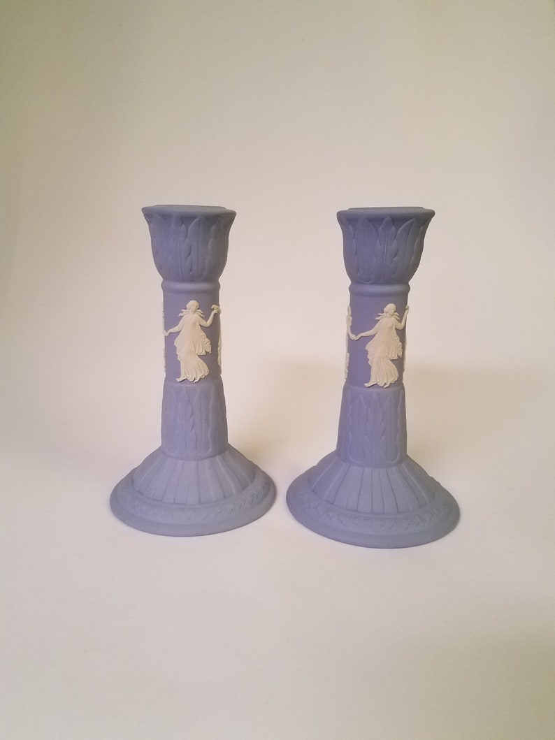 vintage Wedgwood pair of blue Jasperware candlesticks featuring the Dancing Hours
