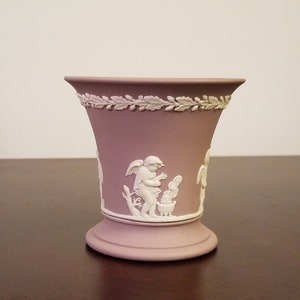 Wedgwood lilac Jasperware flared vase matte finish featuring 4 scenes of cherubs
