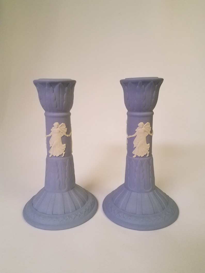 vintage Wedgwood pair of blue Jasperware candlesticks featuring the Dancing Hours