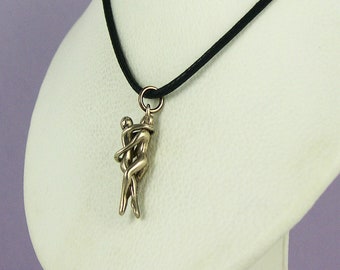 Pendentif puzzle homme/homme Embrace - bronze