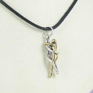 Woman/Woman Embrace Puzzle Pendant-Sterling Silver & Bronze