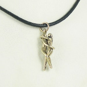 Woman/Woman Embrace Puzzle Pendant-Bronze