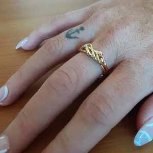Woman/Woman Embrace Puzzle Ring 14K Gold Plate