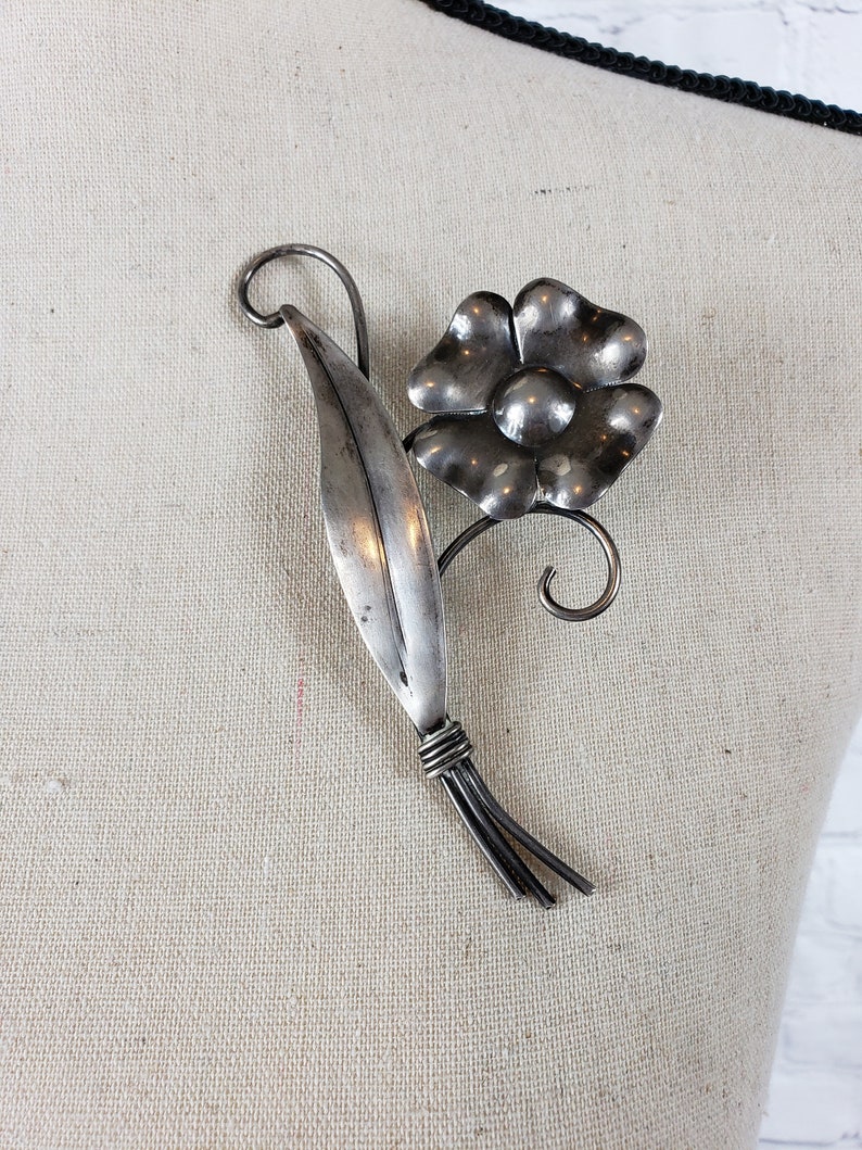 large silver brooch