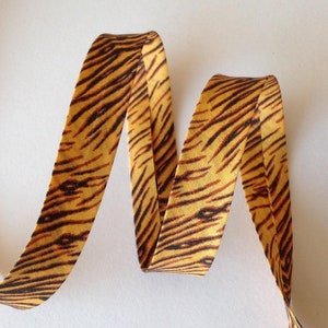 Biais coton motif fantaisie motif tigre rayures marron tabac et jaune savane, biais pré-plié en 2cm, vendu au mètre