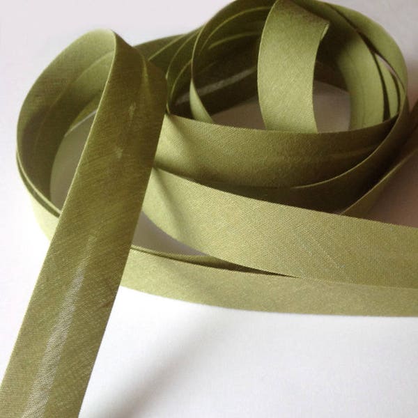 Plain olive green cotton bias binding in 2cm folded with 2 folds, folded and sewn 1cm, bias binding sold by the meter