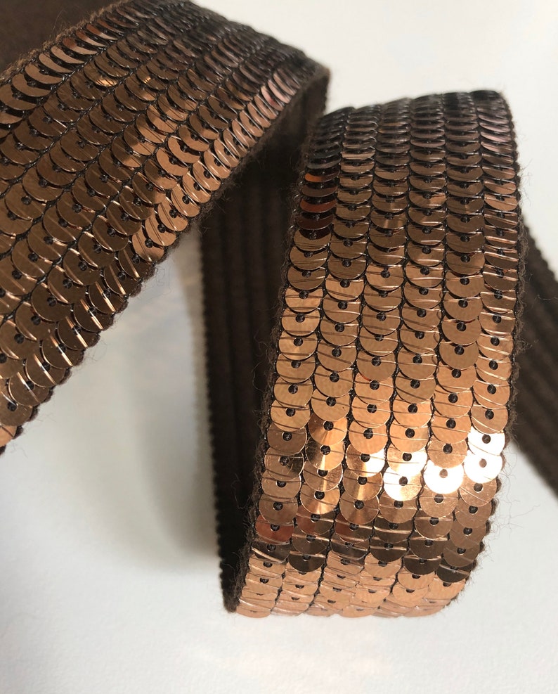 sold to the cut in multiples of 20cm BRONZE SEquins 6 rows of round sequins in 3cm wide