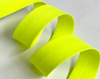 Plain fluorescent yellow bias binding folded 2 folds 2cm wide sold by the meter