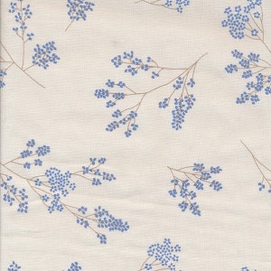 Oilcloth in coated cotton with printed small blue flowers on ecru, sold by the cut in multiples of 10cm