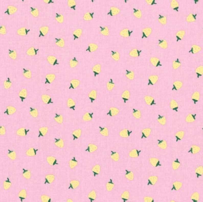 Fruit printed oilcloth in PVC coated cotton with yellow strawberry pattern on a pink background, sold in multiples of 10cm X142cm image 2