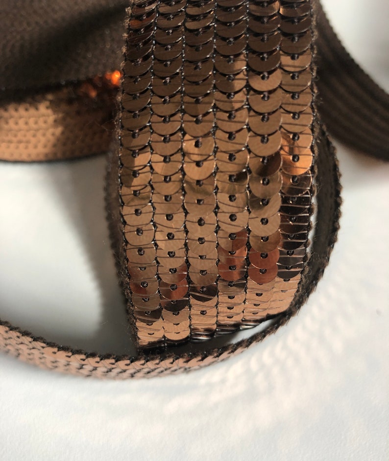 sold to the cut in multiples of 20cm BRONZE SEquins 6 rows of round sequins in 3cm wide