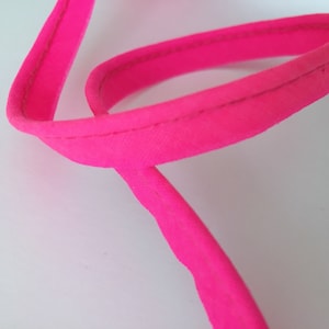 Neon pink protruding bias, neon pink cotton piping, cord thickness 2 mm Ø, sold by the meter