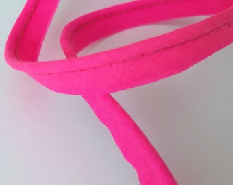 Neon pink protruding bias, neon pink cotton piping, cord thickness 2 mm Ø, sold by the meter