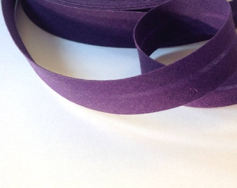 Plain aubergine purple cotton bias binding, 2cm wide, folded, sold by the meter