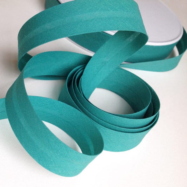 Plain emerald green cotton bias folded 2cm sold by the meter