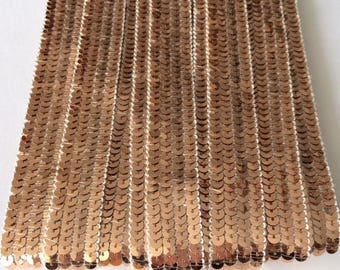 Rose gold and copper glitter trim with round sequins, 4 rows, 2cm wide, sold by the cut in multiples of 25cm