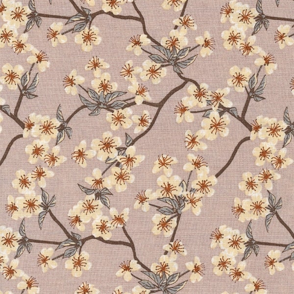 Japanese printed cotton oilcloth with rough apple blossom pattern on powder pink, sold cut in multiples of 10cm