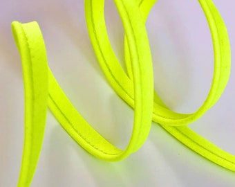 FLUO YELLOW piping extending beyond cotton cord thickness 2 mm Ø in 10mm wide, sold by the meter