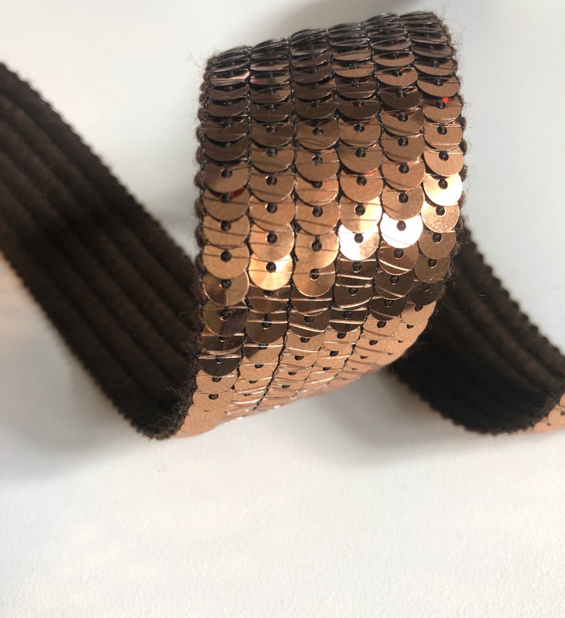 sold to the cut in multiples of 20cm BRONZE SEquins 6 rows of round sequins in 3cm wide