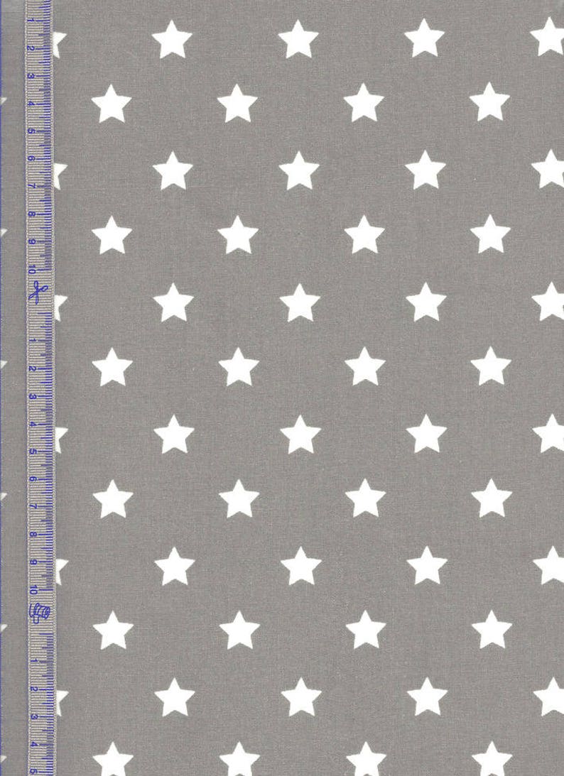 Tissu en toile cirée, coton enduit gris, motif étoiles blanches, pour réaliser votre nappe et travaux fait main, vendu par multiples de 10cm image 1