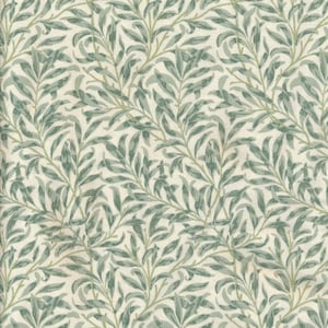 Coated cotton oilcloth with green foliage pattern, sold by the cut in multiples of 10cm (X142cm)