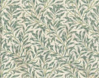 Toile cirée en coton enduit motif feuillage vert, vendu à la coupe par multiple de 10cm (X142cm)