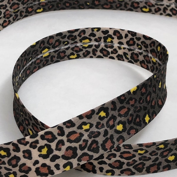 Biais coton motif panthère jaune marron et noir en 2cm pré-plié 2 plis, biais leopard vendu au mètre vendu au metre