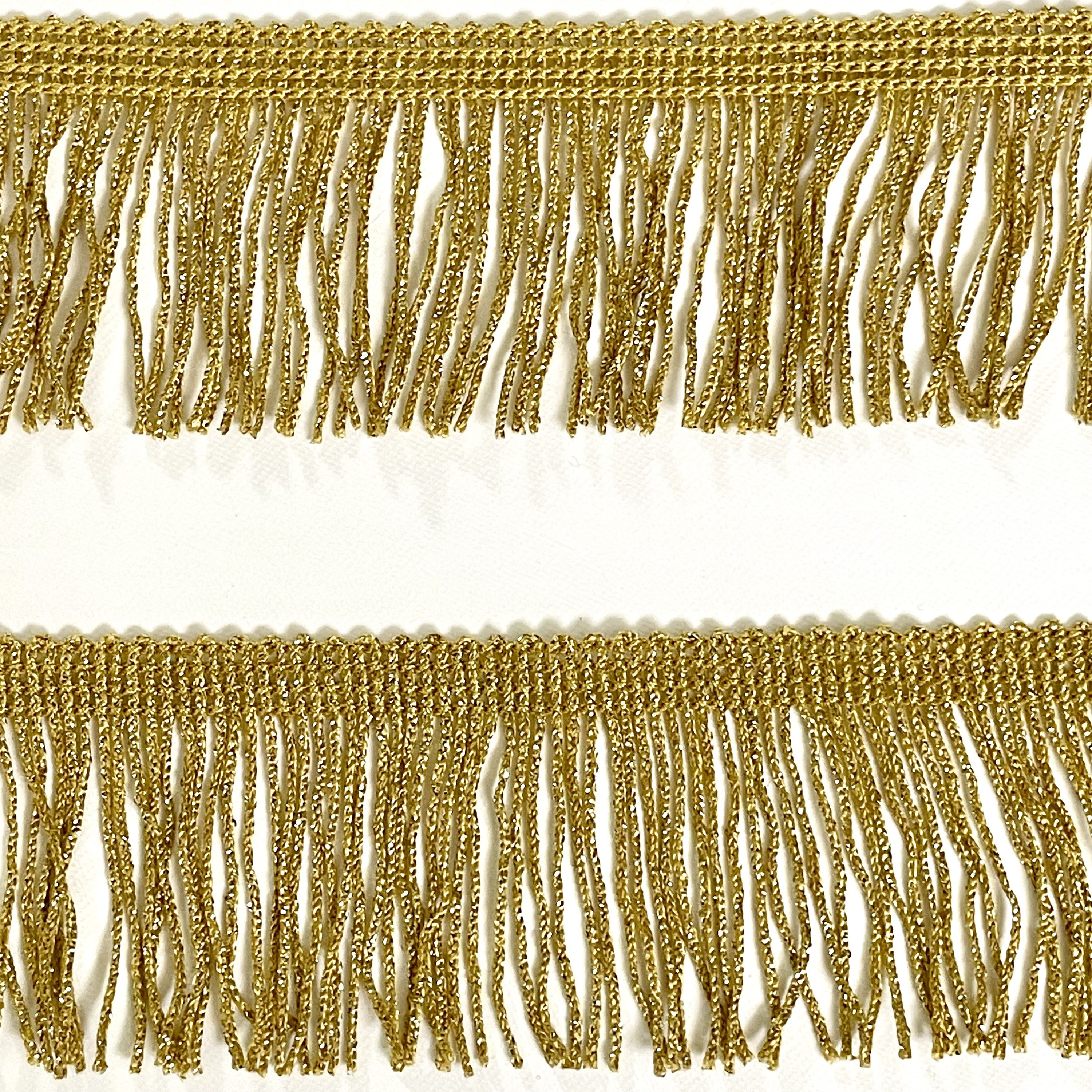 Pasamanería de flecos en lurex dorado Altura cm.9 Paquete mt.10 Producción  italiana ideal para la decoración del hogar costura