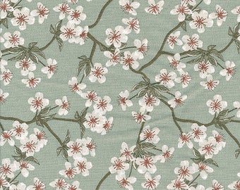 Toile cirée coton imprimé japonais fleurs de pommier vert céladon, enduit finition satiné, vendu a la coupe par multiples de 10cm