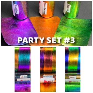 May include: Party Set #3 of iridescent paint in three colors: purple, orange, and green. The paint is in small bottles with labels that say "Jubilee", "Flambeaux", and "Revel".