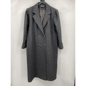 May include: A charcoal gray double-breasted long coat featuring a notched lapel, cuffed sleeves, and two visible buttons. The interior lining displays a brown and black paisley pattern, and the brand label JOFELD is visible at the neck.