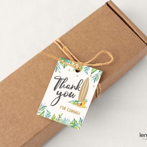 May include: White thank you tag with green tropical leaves, a surfboard, and gold glitter. The text reads "Thank you for coming!"