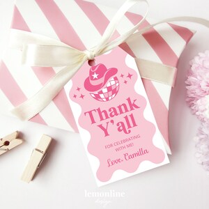 May include: Pink thank you tag with a pink cowboy hat and disco ball design. The text reads "Thank Y'all for celebrating with me! Love, Camilla".