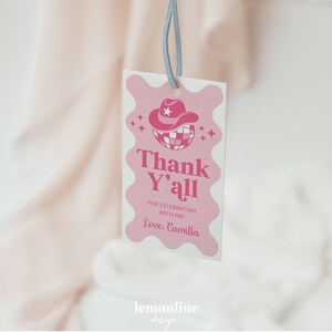 May include: Pink thank you tag with a pink disco ball and cowboy hat graphic. The text reads "Thank Y'all" and "For celebrating with me! Love, Camilla".