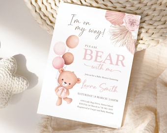 May include: A pink and brown baby shower invitation with a cartoon bear holding balloons. The invitation says "I'm on my way! Please bear with me." and includes the text "Join us for a Baby Shower honoring Laura Smith. Saturday 8 March | 2:00PM. 4396 Lady Bug Drive, Staten Island. RSVP by 1st March to 718-982-3050. Registered at Target and Baby Bunting."