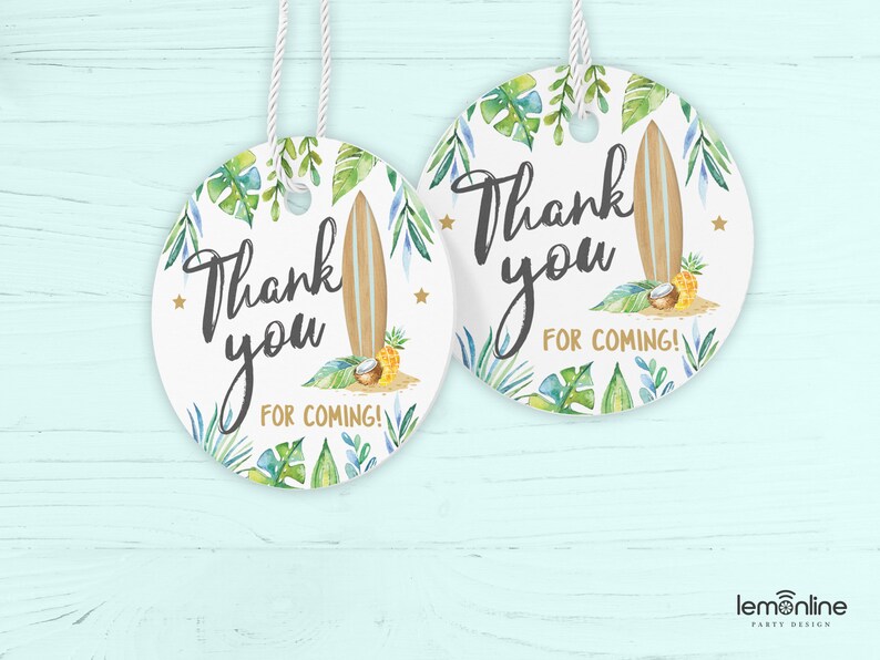 May include: Two round white thank you tags with a tropical theme. The tags feature a surfboard, pineapple, coconut, and green and blue tropical leaves. The text on the tags reads "Thank you for coming!"