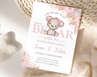 May include: A pink and white baby shower invitation with a cute cartoon bear illustration. The invitation says "Please Bear with me" and includes the date and time of the shower.