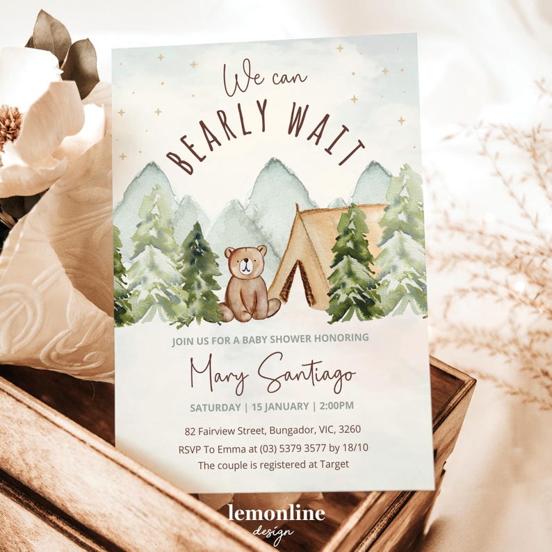 May include: A baby shower invitation with a watercolor illustration of a bear and a tent in a forest setting. The text reads "We can BEARLY WAIT" and includes the name "Mary Santiago" and details for the event.