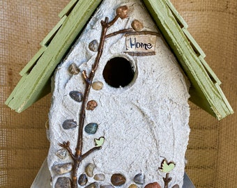 Ships same day or next.Stone birdhouse with shingled roof. Hanger included, durable outdoors and handmade in Michigan.