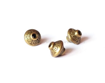 7mm - 10 or 100 Tibetan Style Bead Spacers