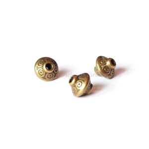 7mm - 10 or 100 Tibetan Style Bead Spacers