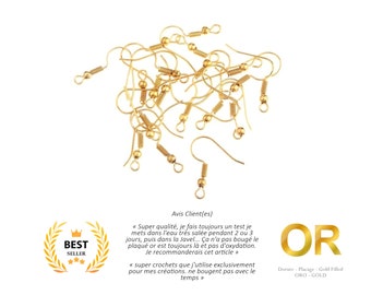 May include: A close-up of a pile of gold-plated earring hooks. The hooks are made of metal and have a spring-loaded closure. The text "OR" is visible in the image, which stands for "Gold Filled".