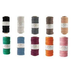 May include: Ten spools of hemp cord in a variety of colours, including black, white, grey, brown, green, blue, burgundy, orange, and pink. Each spool has a label that says "Hemp Cord" and features a stylised "H" logo.
